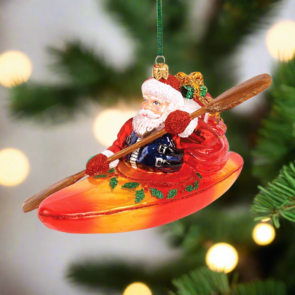 Santa In Kayak Ornament