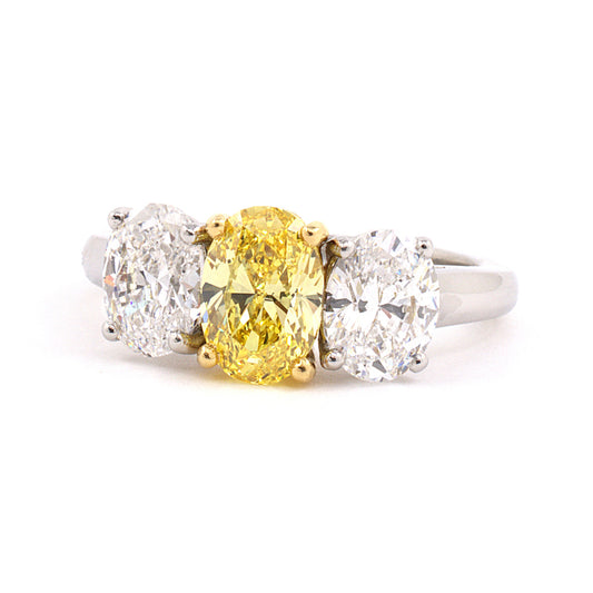 Estate Oval Diamond 3-Stone Ring with Fancy Vivid Yellow Diamond
