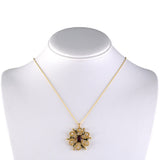 K. Goldschmidt Diamond & Garnet Pinwheel Pendant Necklace