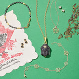 Gold Shou Pendant Necklace with Diamond Bale