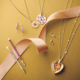 Huggie Hoop Earrings in Pink Sapphires