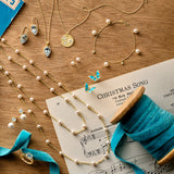 Dogwood Pendant Necklace in Akoya Pearls, Topaz & Diamonds